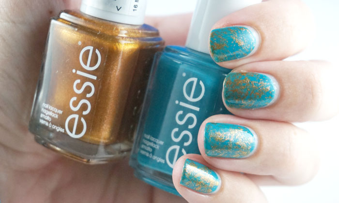 Saran wrap nail art done with two essie nail polishes
